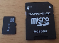 Micro SD card and adapter.