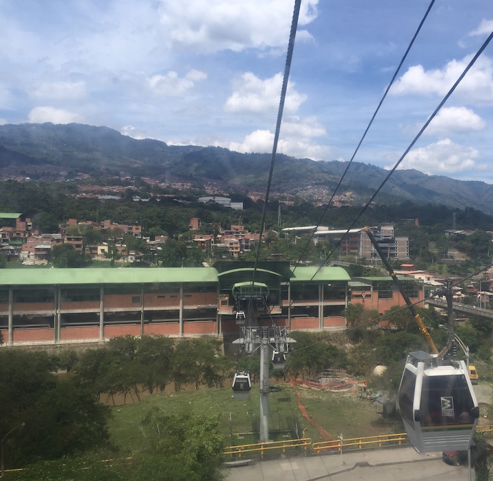 Cable cars over local neighborhoods.