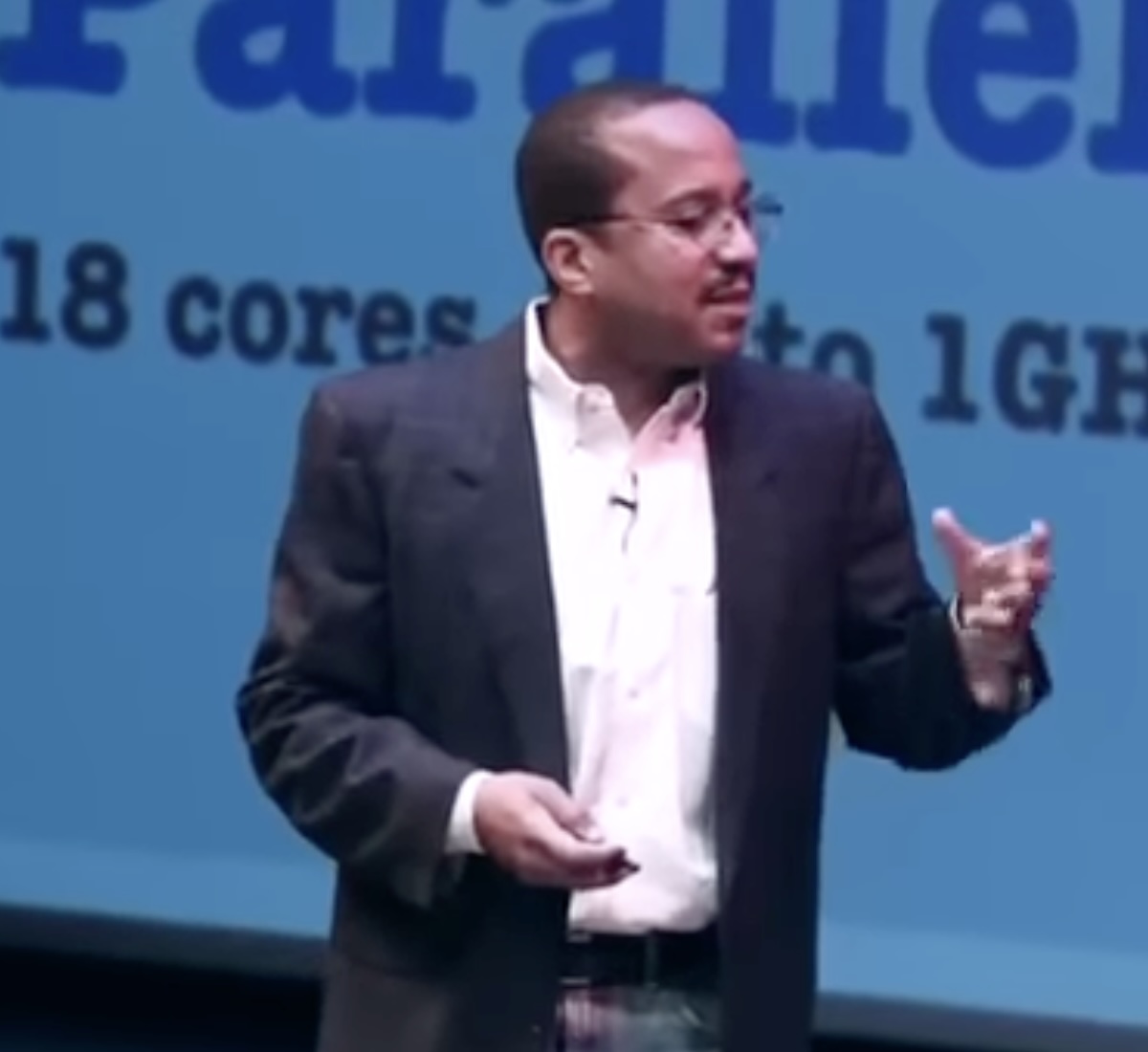 Ray Hightower speaking on stage